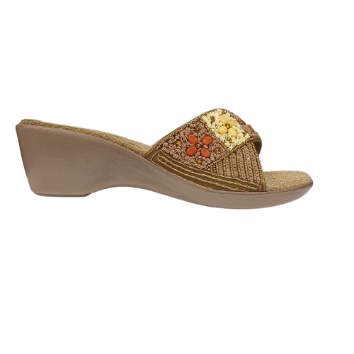 Brown wedge sandal with decorative pattern on a white background