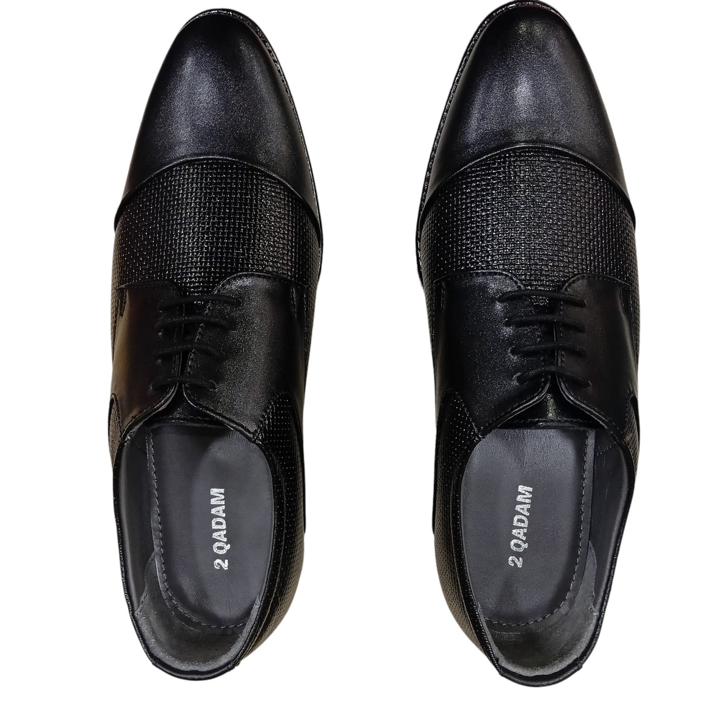 Pair of black dress shoes with textured toe caps on a white background