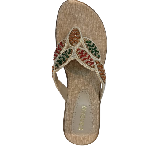 Beige sandal with colorful embellishments on a white background