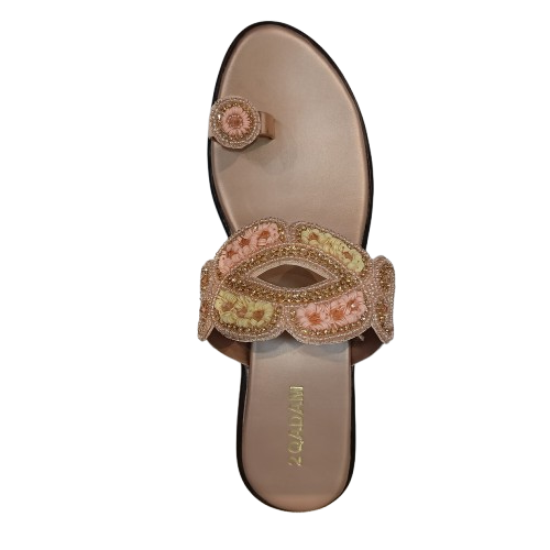 Decorative sandal with floral patterns on a white background