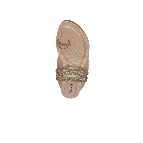 Beige sandal with a decorative strap on a white background